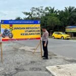Operasi Lilin Lancang Kuning Tahun 2024, Satlantas Polres Siak Pasang Spanduk Himbauan